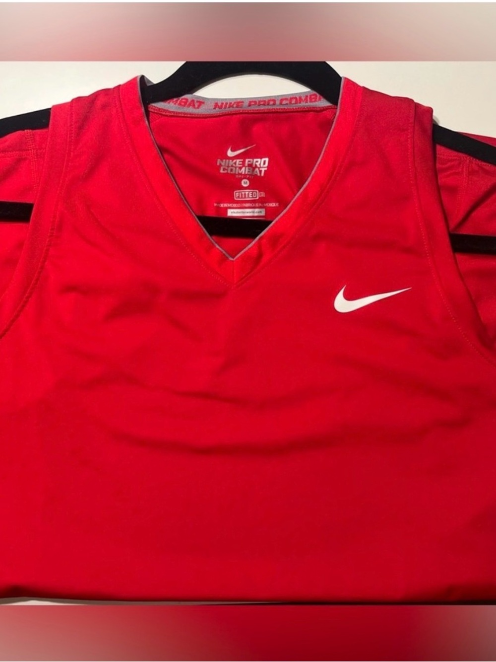 Nike Red V-Neck Sleeveless Athletic Top with White Swoosh
